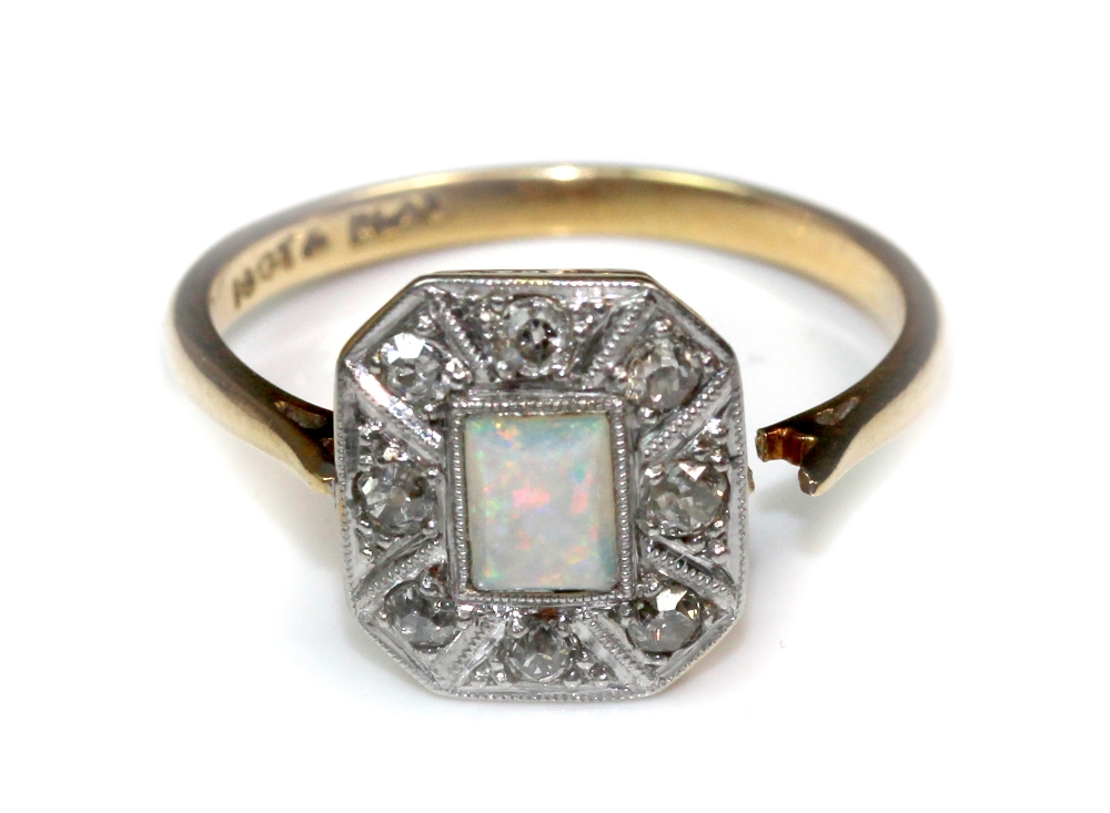 An opal and diamond cluster ring, early