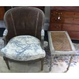 A Louis XVI style carved grey painted bergere, first half 20th century,