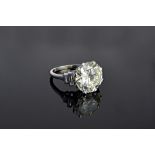 A single stone diamond ring, the principal round brilliant cut diamond weighs approximately 5.