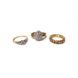 A 9ct gold and diamond set oval cluster ring, mounted with circular cut and baguette diamonds,