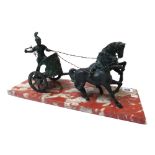 A patinated bronze, depicting a Roman charioteer with two horses, 20th century,