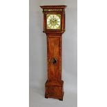 A Queen Anne walnut longcase clock The movement by Charles Gretton,