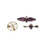 A gold, amethyst and seed pearl set bar brooch,