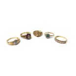 A 9ct gold, ruby and diamond set marquise shaped luster ring,