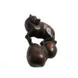 A Japanese wood netsuke of a horse and gourd, 19th/20th, 3.5cm.high.