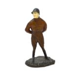 A French bronze and ivory statuette of the actor Max Dearly dressed as a jockey, signed 'P.E.