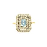 A gold, aquamarine and diamond rectangular cluster ring,