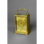 A French giltmetal engraved carriage clock Circa 1860 The one-piece case engraved all over with