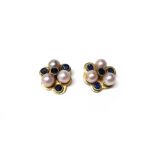 A pair of gilt metal, cultured pearl and sapphire set earclips, each of trefoil form,