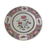 A pair of Chinese famille-rose plates, Qianlong, painted in the centre with flowering peony,