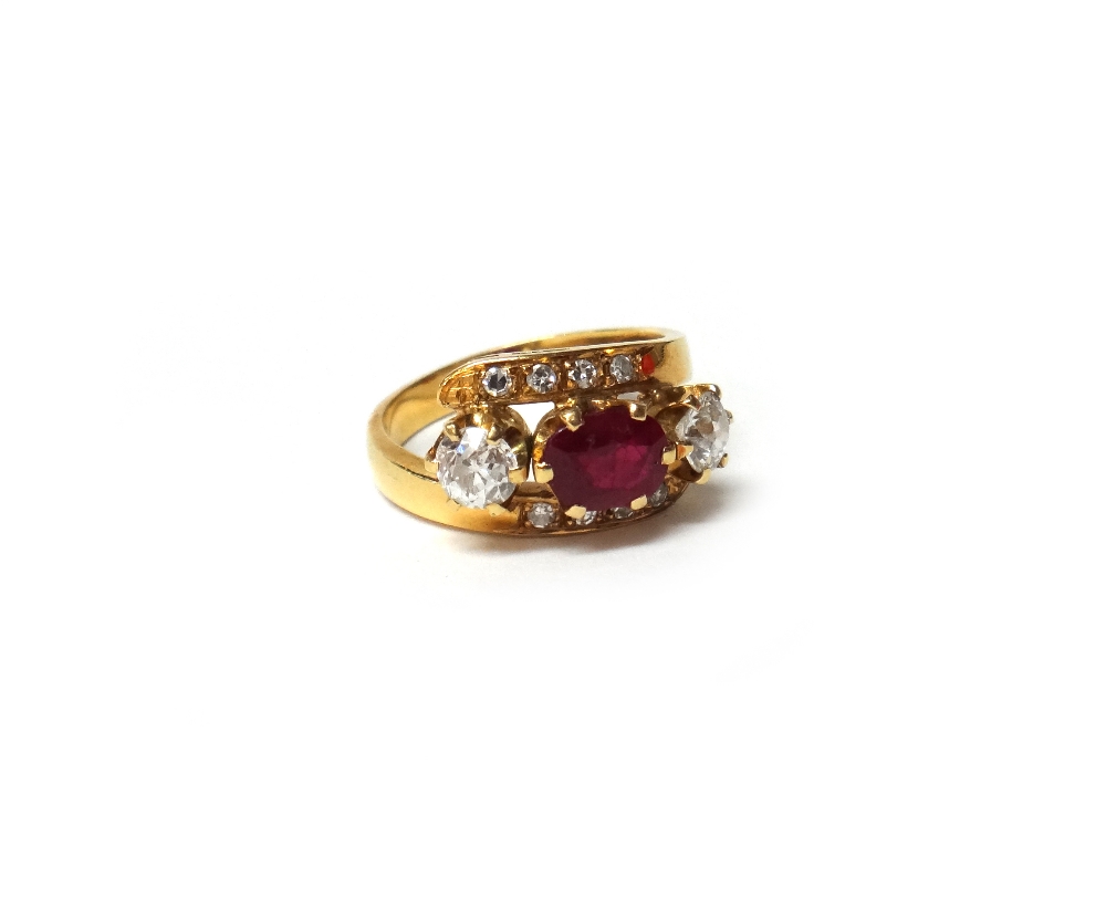 A gold, ruby and diamond set ring,