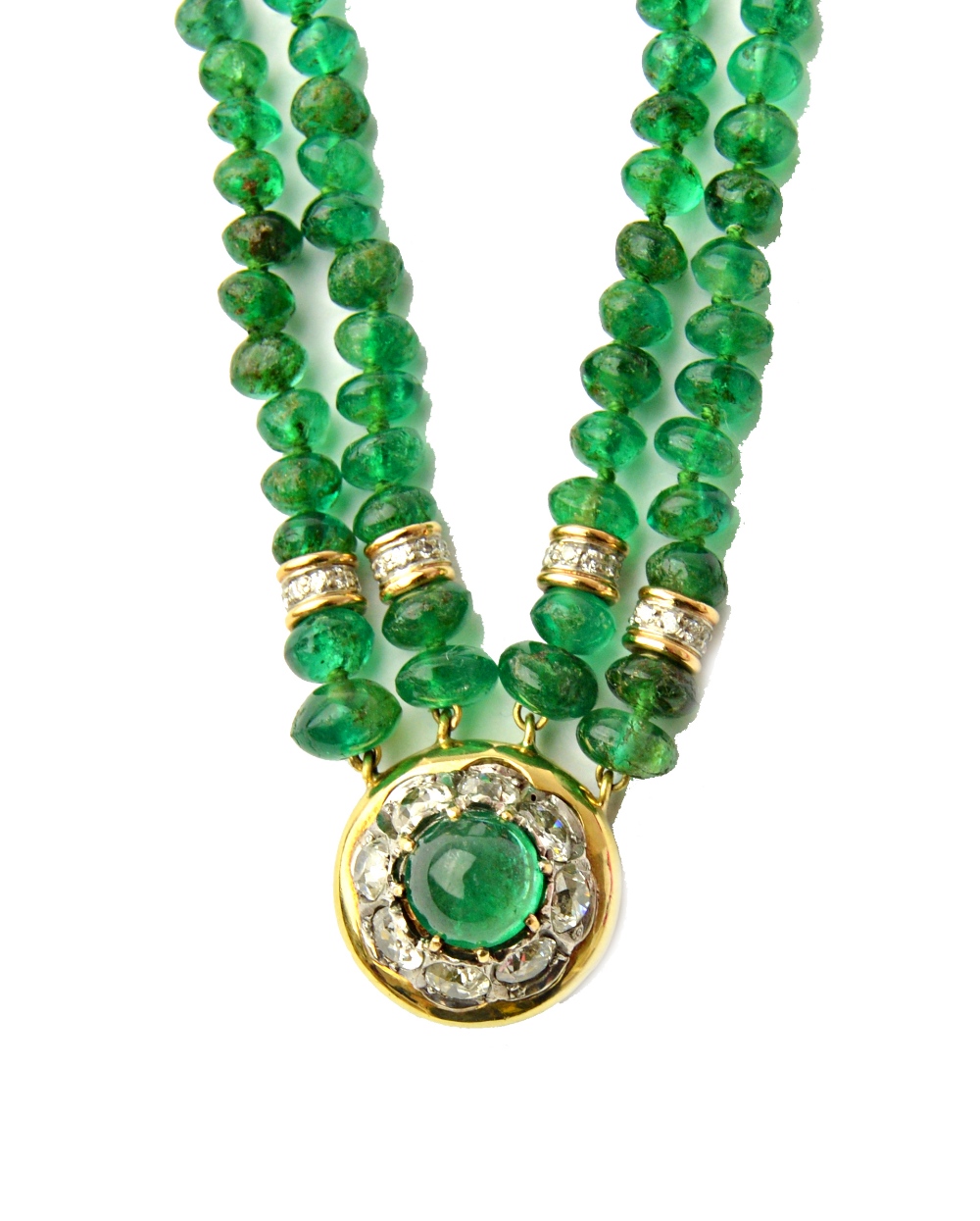A gold mounted emerald and diamond bracelet, by Tambetti, formed as four rows of emerald beads,