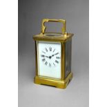 A French brass carriage clock By Couaillet, circa 1910 In a Corniche case,