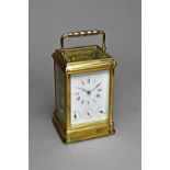 A French brass carriage clock By L'Epée, late 20th century In a Gorge case,