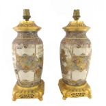 A pair of Japanese Satsuma vases, Meiji period, adapted as lamps with gilt-metal mounts,