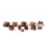 A group of Chinese Yixing teawares, 19th/20th century, comprising; four cups, two teabowls,