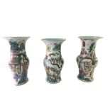 Three Chinese famille-rose baluster vases, late 19th/early 20th century,