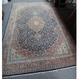 An Indian carpet of Persian design, 280cm x 184cm.