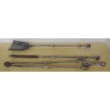 A set of Victorian steel fire irons with double knopped plain stem and spherical pommel,