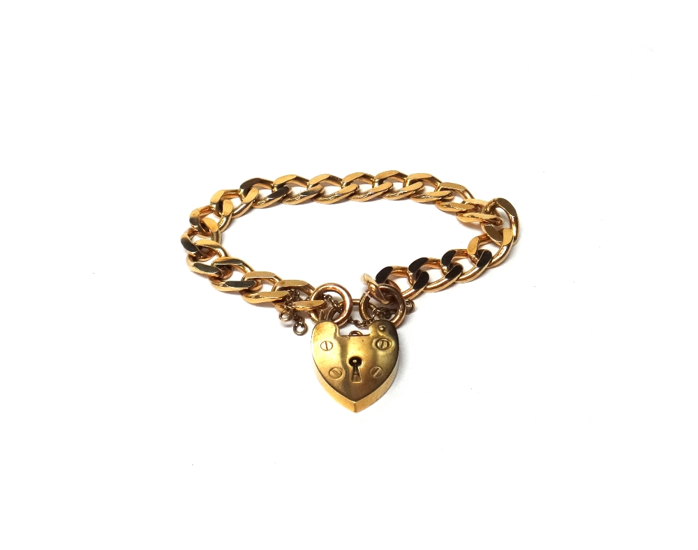 A 9ct gold faceted curb link bracelet, with a 9ct gold heart shaped padlock clasp, weight 22.4 gms.