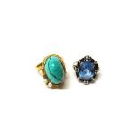 A gold ring, mounted with a turquoise matrix and with two cultured pearls,