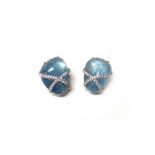 A pair of white gold mounted, aquamarine and diamond set earclips,