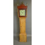 A pine 30 hour longcase clock 19th century The case with an arched pediment,