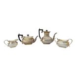 A silver four piece tea and coffee set, comprising; a teapot, a coffee pot,