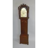 An oak longcase clock The movement by Thomas Cragg, Horsham,