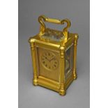 A French brass carriage clock By Richard, circa 1900 The case with a shaped reeded handle,