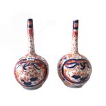 A pair of Japanese Imari bottle vases, Meiji period,
