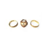 Two 9ct gold wedding rings and a 9ct gold heart shaped padlock clasp, London 1905,