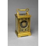 A French brass carriage clock Retailed by Hamilton & Inches, Paris,