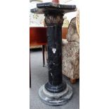 A modern black veined marble jardiniere stand, of turned and stepped circular form,