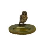 An Austrian cold painted bronze owl, circa 1930, possibly Franz Bergmann, on an onyx oval base,