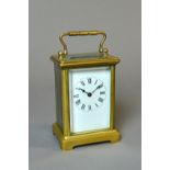 A French brass carriage timepiece Circa 1900 With rectangular case,