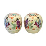 A pair of Chinese famille-rose oviform jars, circa 1900,