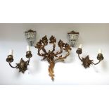 A brass rococo style five branch wall light,