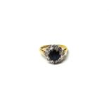 An 18ct gold, sapphire and diamond set cluster ring,