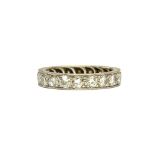 A platinum and diamond set full eternity ring, mounted with circular cut diamonds, detailed PLAT,