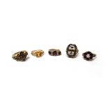 Four mostly 9ct gold and gem set rings, to include; a garnet and cultured pearl cluster ring,