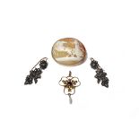 A gold mounted, oval shell cameo brooch, carved as a classical chariot scene, detailed 9 CT,