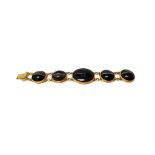 A gold mounted banded agate bracelet,