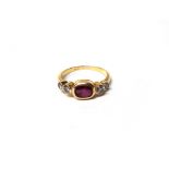 A gold, diamond and garnet set ring,