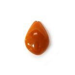 A reconstituted amber drop shaped pendant, damaged at the top by the drill hole, weight 38.5 gms.