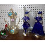 A pair of Continental blue glass figures,