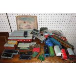 A quantity of toys, including a quantity of 00 gauge tenders, a wooden jigsaw boxed,