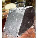 An early 20th century black painted metal coal scuttle.