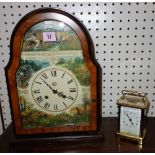 A single train brass carriage clock and a modern mantel clock.