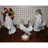 A small group of modern porcelain figures including Doulton, Lladro and Copenhagan (qty).